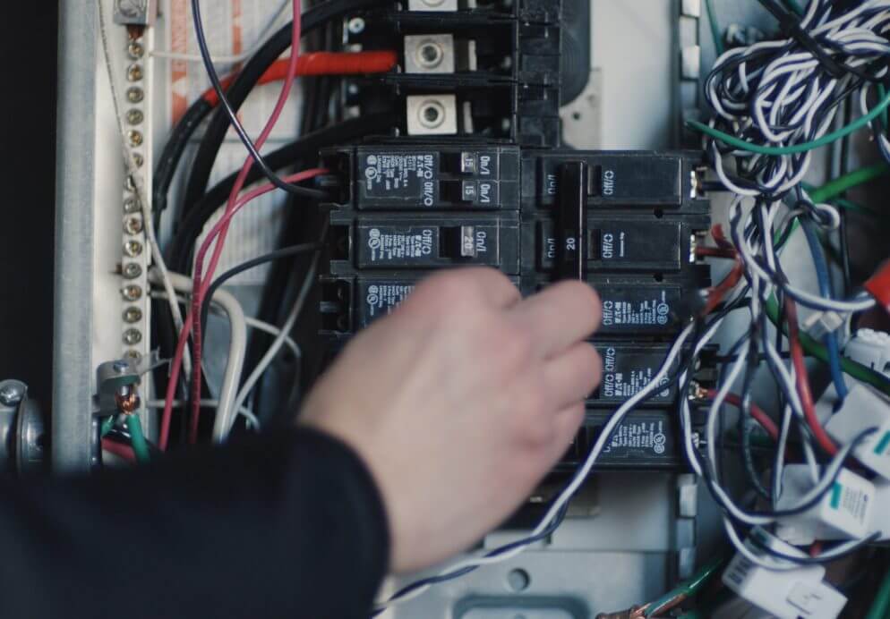 Hand flipping switches in electrical box