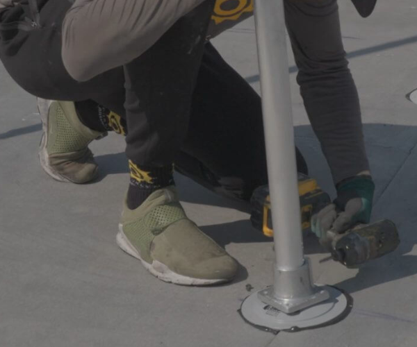 waterproofing the connections while installing solar panels on a flat roof in NYC