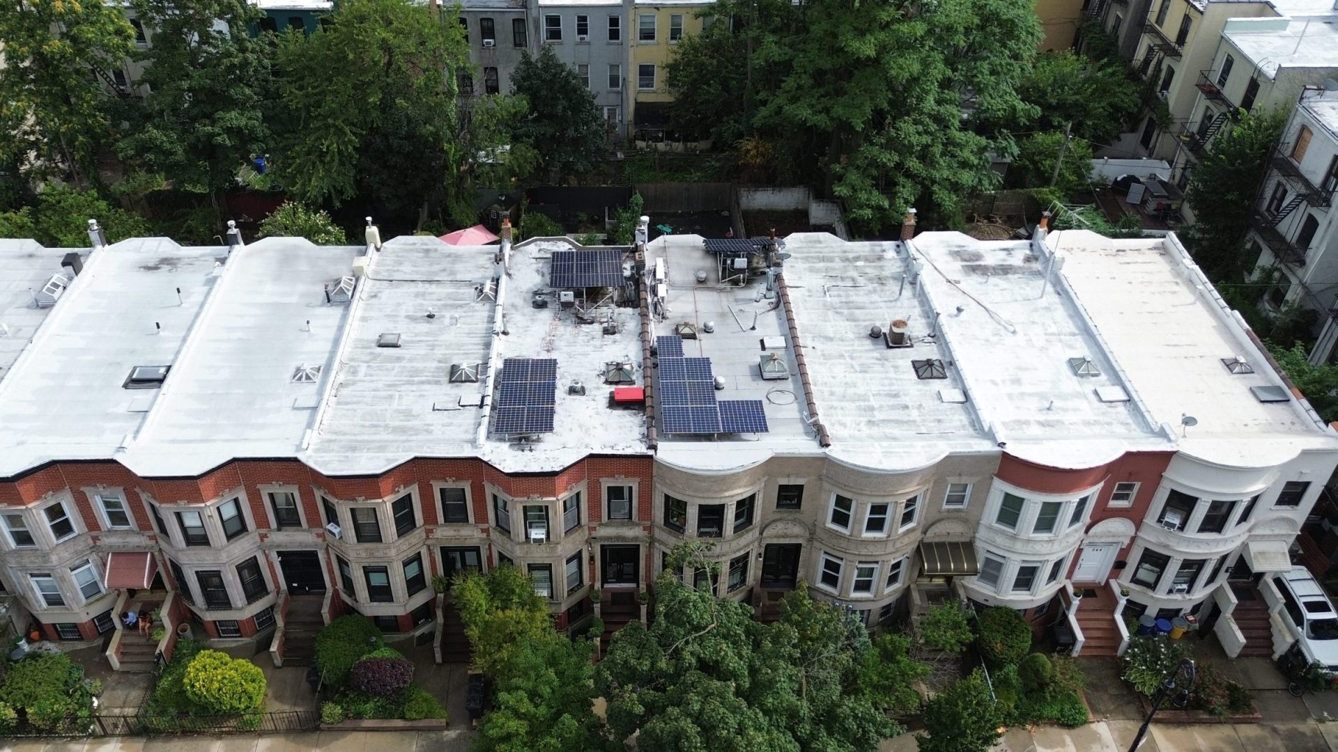 Solar panel tilt racks on historic homes in Brooklyn